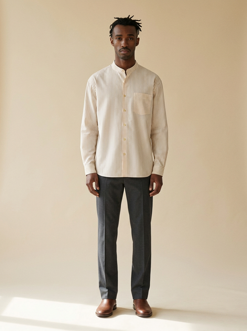 Model wearing The Apricot Stripe Shirt. Generated image; the manufacturer's own photograph of this garment appears below.