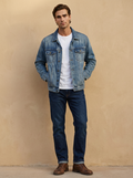 Model wearing The Denim Jacket. Generated image; the manufacturer's own photograph of this garment appears below.